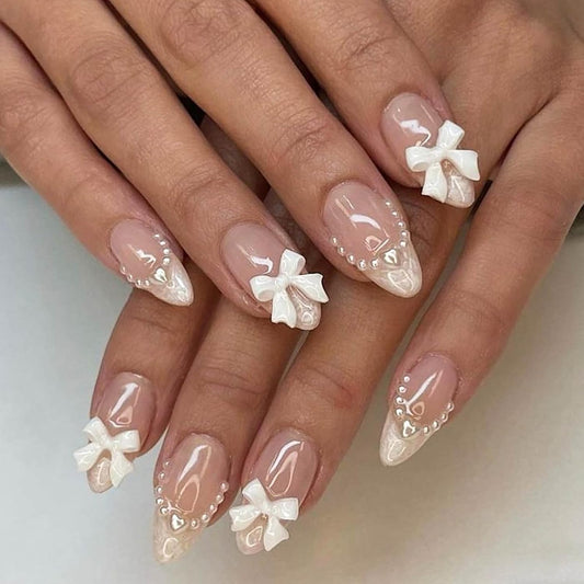 Cute Press on Nails Short Almond  French Tip Fake Nails Nude Full Cover Pearl Bow Charm False Nails with Designs Glossy Glue on Nails Petite Acrylic Nails Artificial Nails for Women Girls 24Pcs